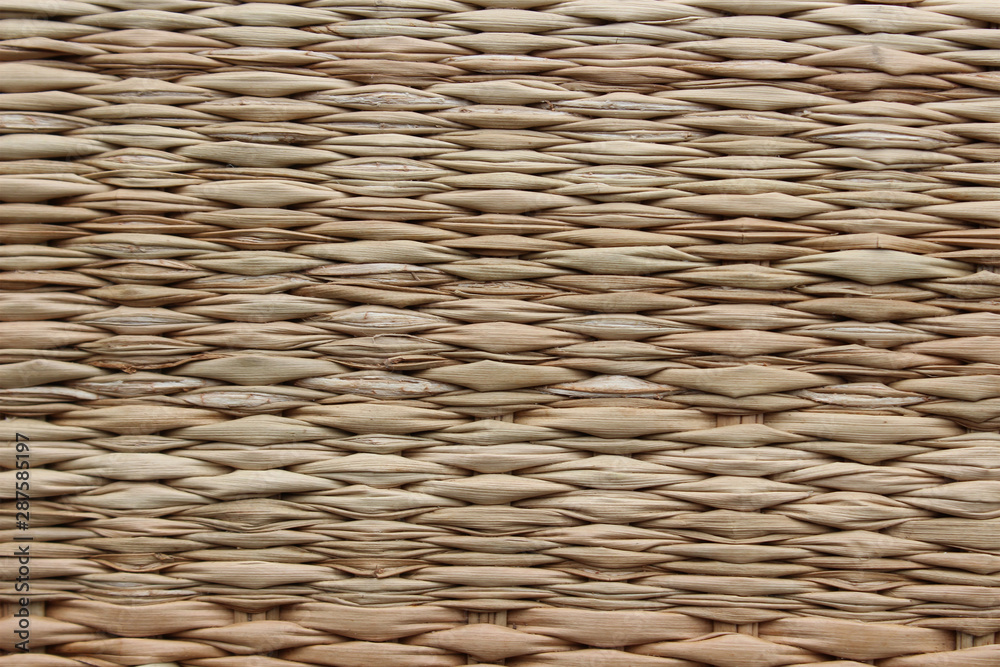 Obraz premium Wicker background, a fragment of a wicker basket