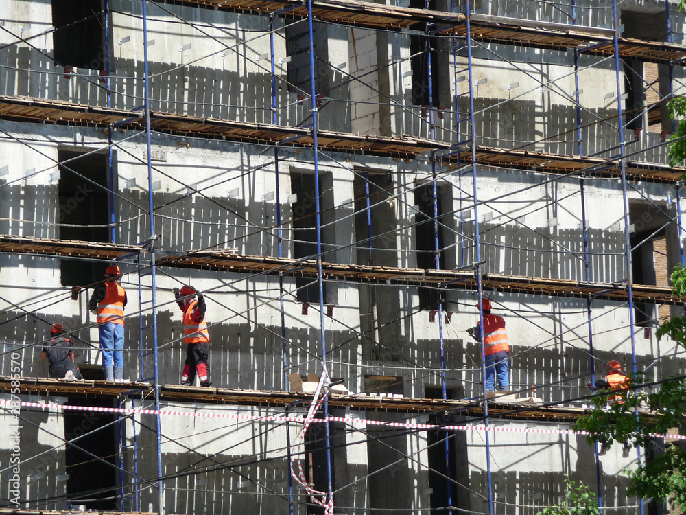 Workers on scaffolding