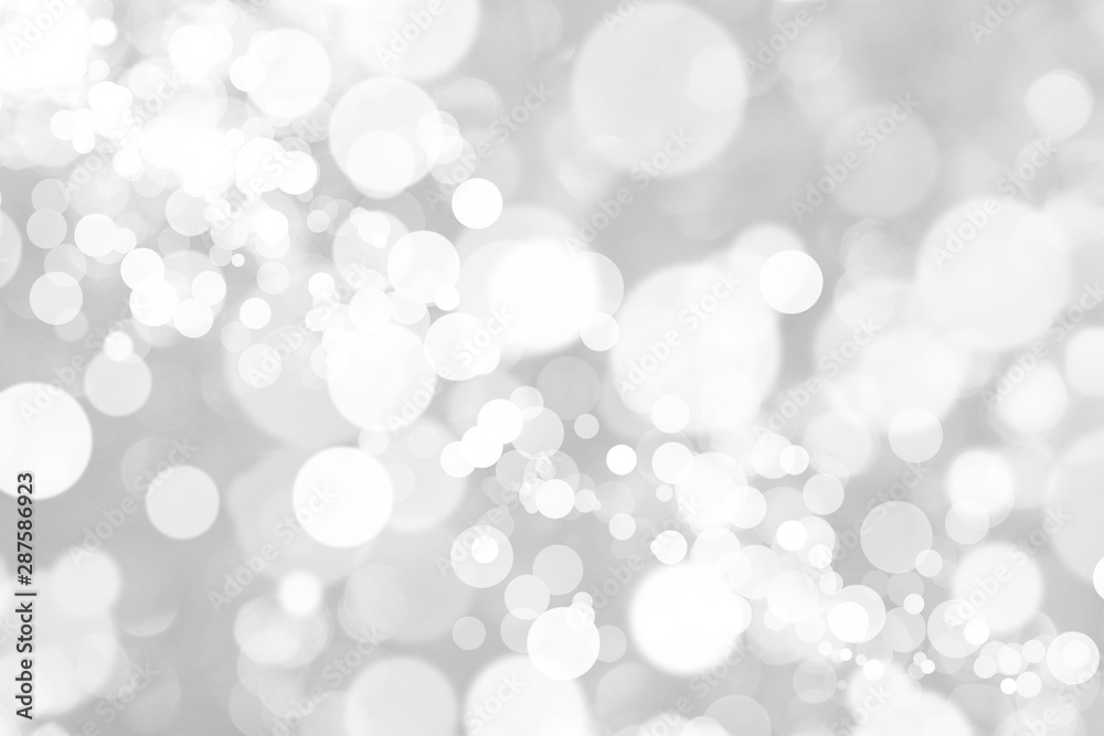 Abstract background with White bokeh on gray background. christmas blurred beautiful shiny Christmas lights.