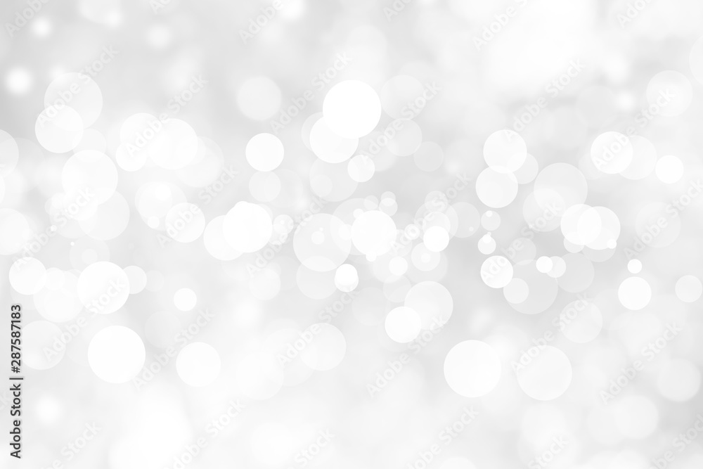 Abstract background with White bokeh on gray background. christmas blurred beautiful shiny Christmas lights. Abstract background with White bokeh on gray background. christmas blurred beautiful shiny Christmas lights.