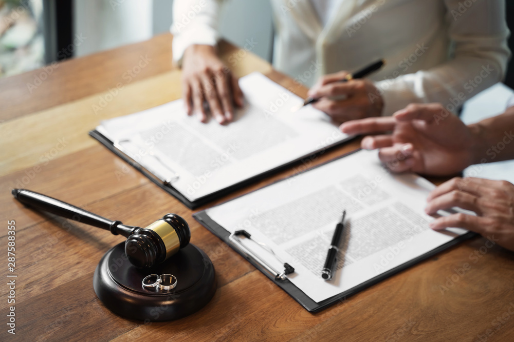 Judge gavel with pair of marriage ring, Divorce concept. Judge gavel with pair of marriage ring, Divorce concept.