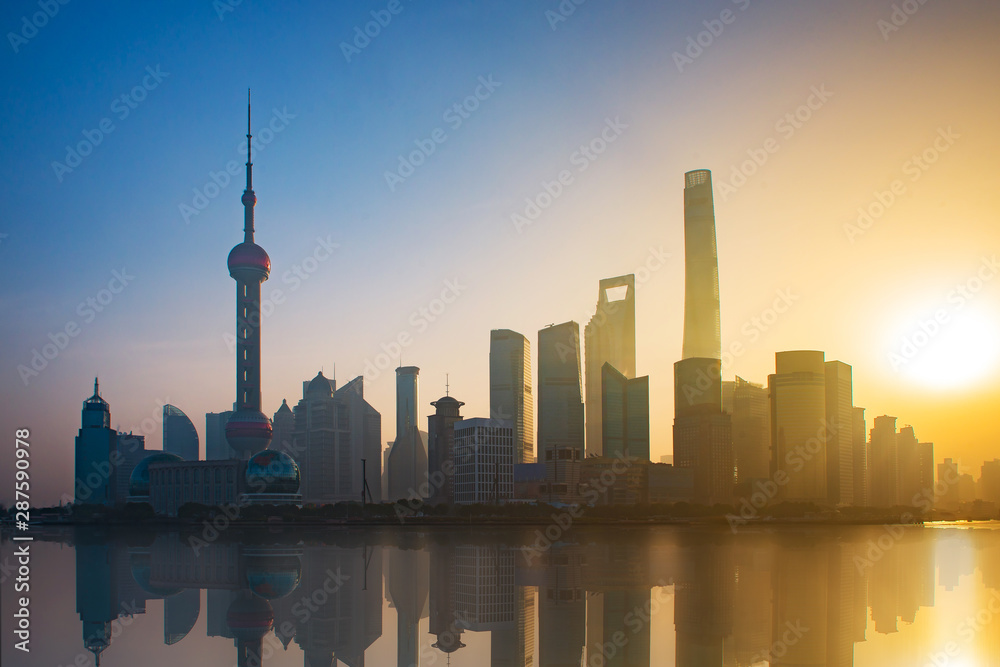 Landscape view of shanghai skyline and huangpu river in morning with sunrise, China.