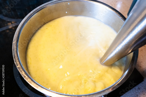 cooking vegetable soup puree in stewpan