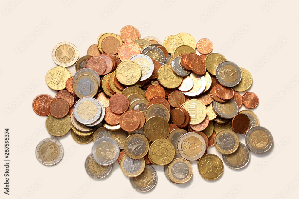 a large pile of metal coins of the European Union in bulk a large pile of metal coins of the European Union in bulk
