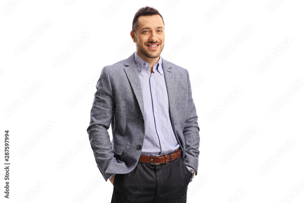 Young elegant man posing with hands in pockets Young elegant man posing with hands in pockets