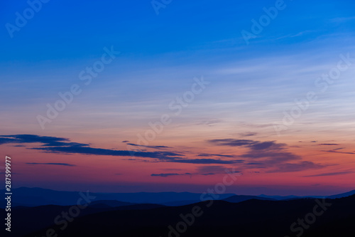 Colorful sunset over the mountain hills. Location place Carpathians, Borzhava ridge.