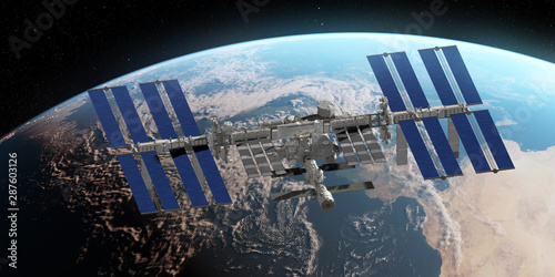 Fototapeta Naklejka Na Ścianę i Meble -  3d rendered illustration of the ISS infront of the earth