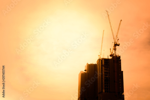 Building crane and buildings under construction in the city.