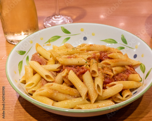 Pasta alfredo penne with tomato based sauce