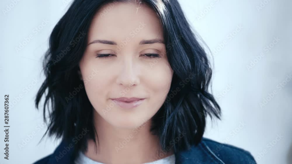 attractive and smiling woman looking at camera attractive and smiling woman looking at camera
