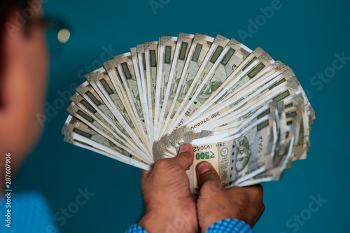 Front View of Man Holding Jackpot Money photo