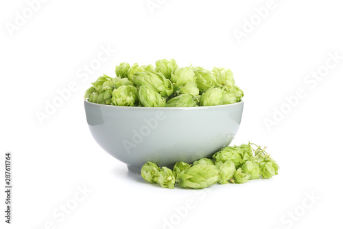 Bowl with hop cones isolated on white background