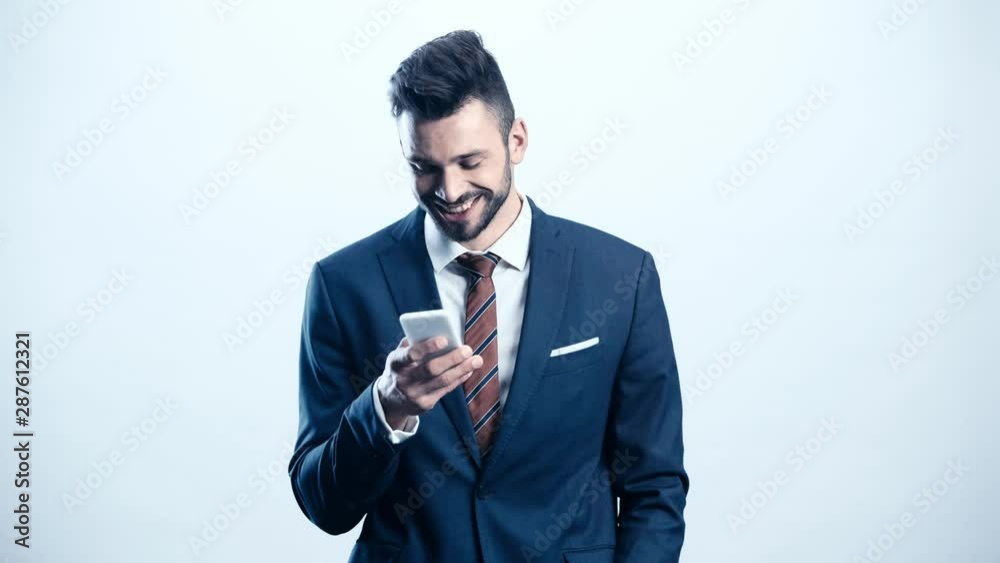 happy businessman using smartphone on white happy businessman using smartphone on white