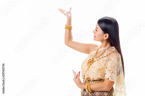 Beautiful woman Thai dancing in national traditional costume of Thailand. Isotate on white background.