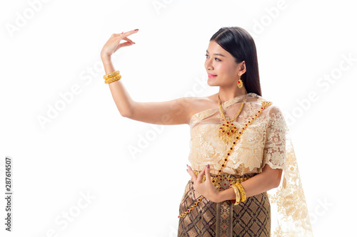 Beautiful woman Thai dancing in national traditional costume of Thailand. Isotate on white background.
