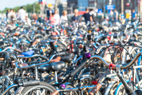 Amsterdam, North Holland / Netherlands - June 22nd, 2019: Hundreds of bicycles parked in downtown