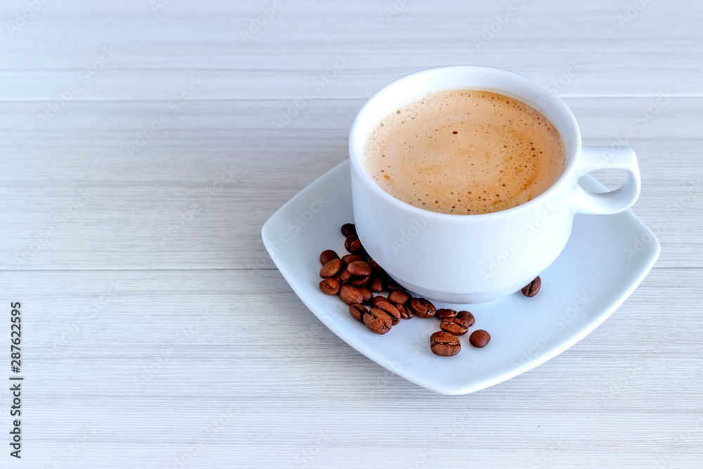 Coffee in cup and coffee beans, isolated spread on a white background. Coffee in cup and coffee beans, isolated spread on a white background.