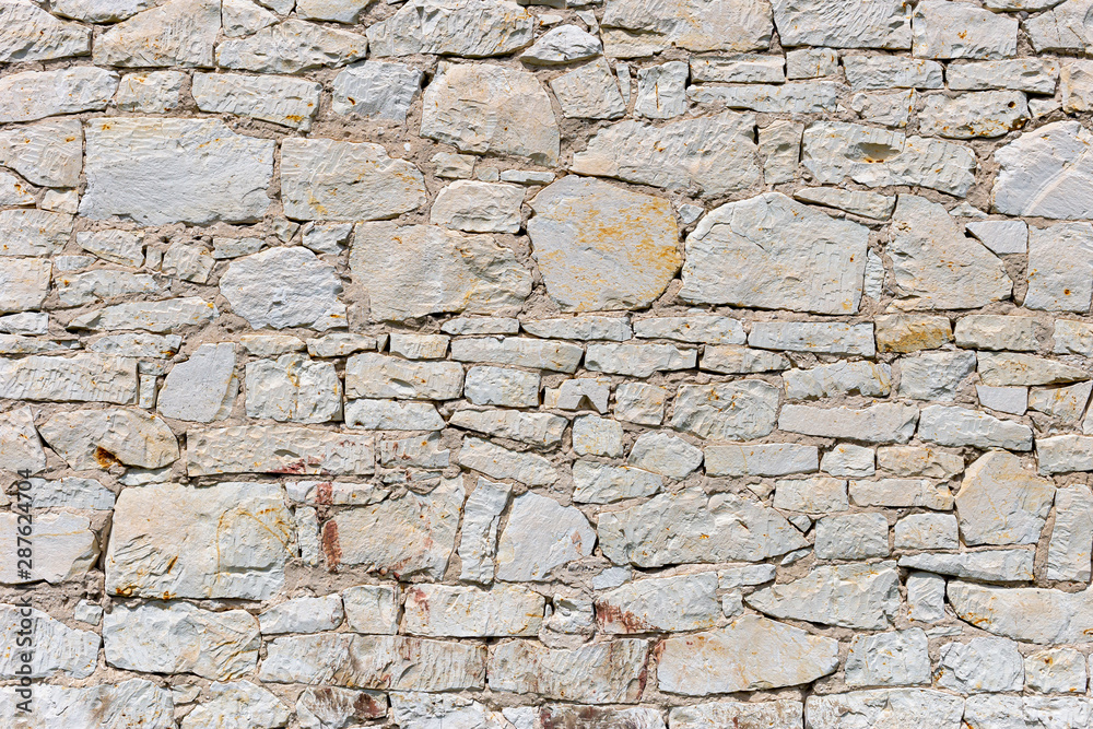 Stone wall for use as a background Stone wall for use as a background