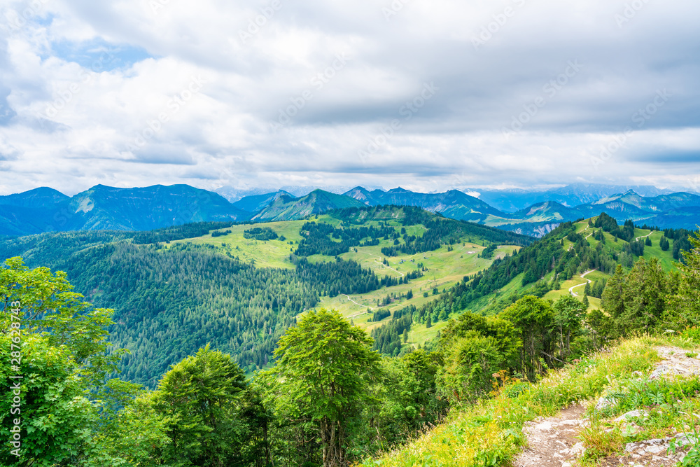 View of mountains into the distance from Zwolferhorn mountain in St. Gilgen in Salzkammergut region, Austria