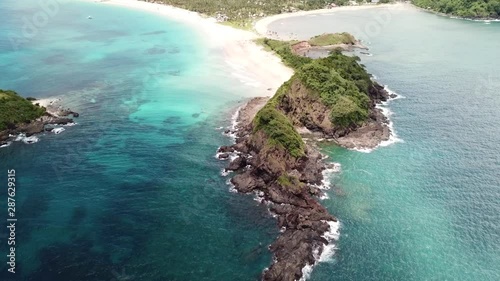 Aerial: Beautiful landscape of the Napcan Beach on a greatful day on Philippines. Popular travel destination. photo