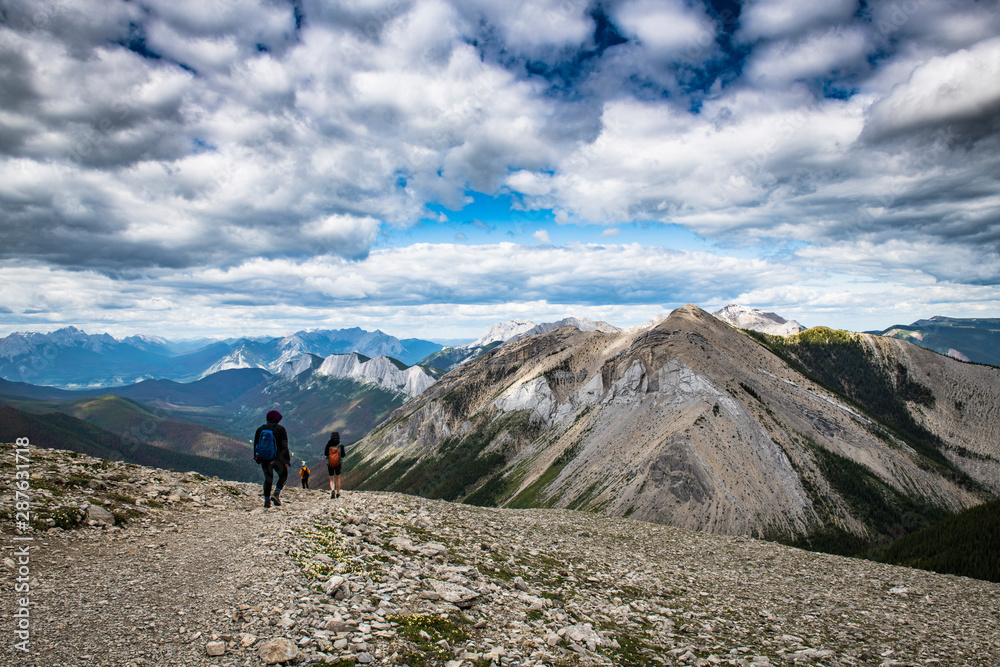 Hikers on a trail of the Canadian Rockies in Jasper National Park, Alberta, Canada