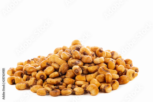a pile of toasted salted corn on a white background photo