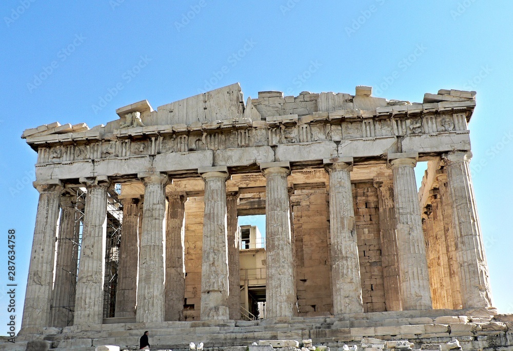 The Parthenon Temple with blue sky in the Acropolis of Athens, Greece. 
