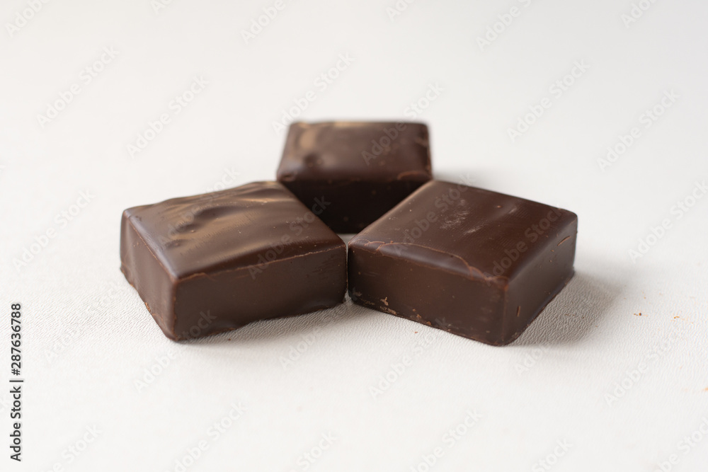 Chocolate candies on a white background. Chocolate candies on a white background.
