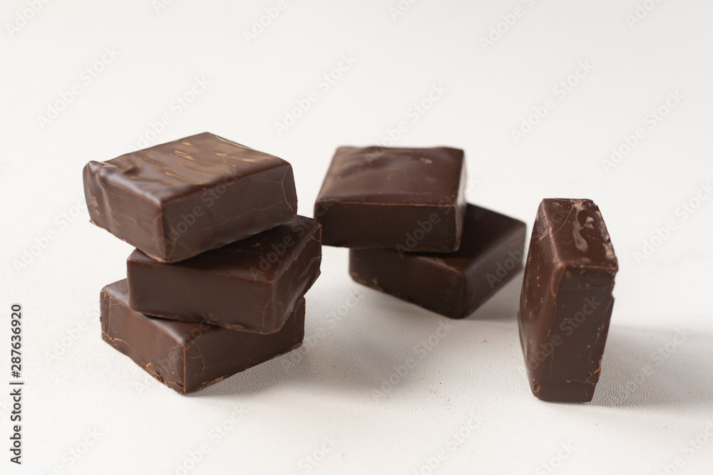 Chocolate candies on a white background. Chocolate candies on a white background.