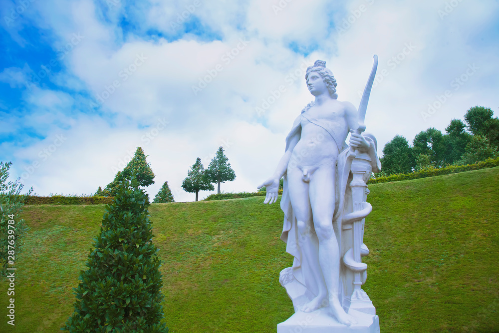 Ancient statue of god of light, music and harmony Apollo. He is the son