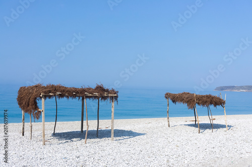 Straw canopy on the beach. Borsh Albania photo