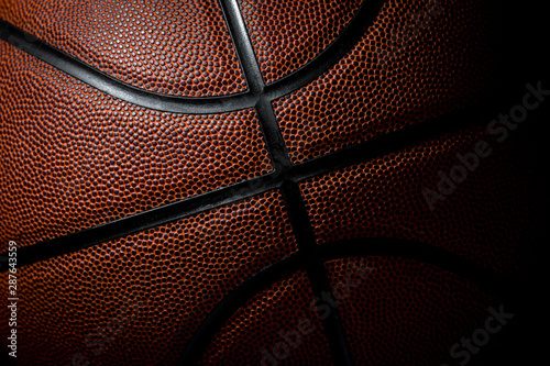 Closeup detail of basketball ball texture background © Augustas Cetkauskas