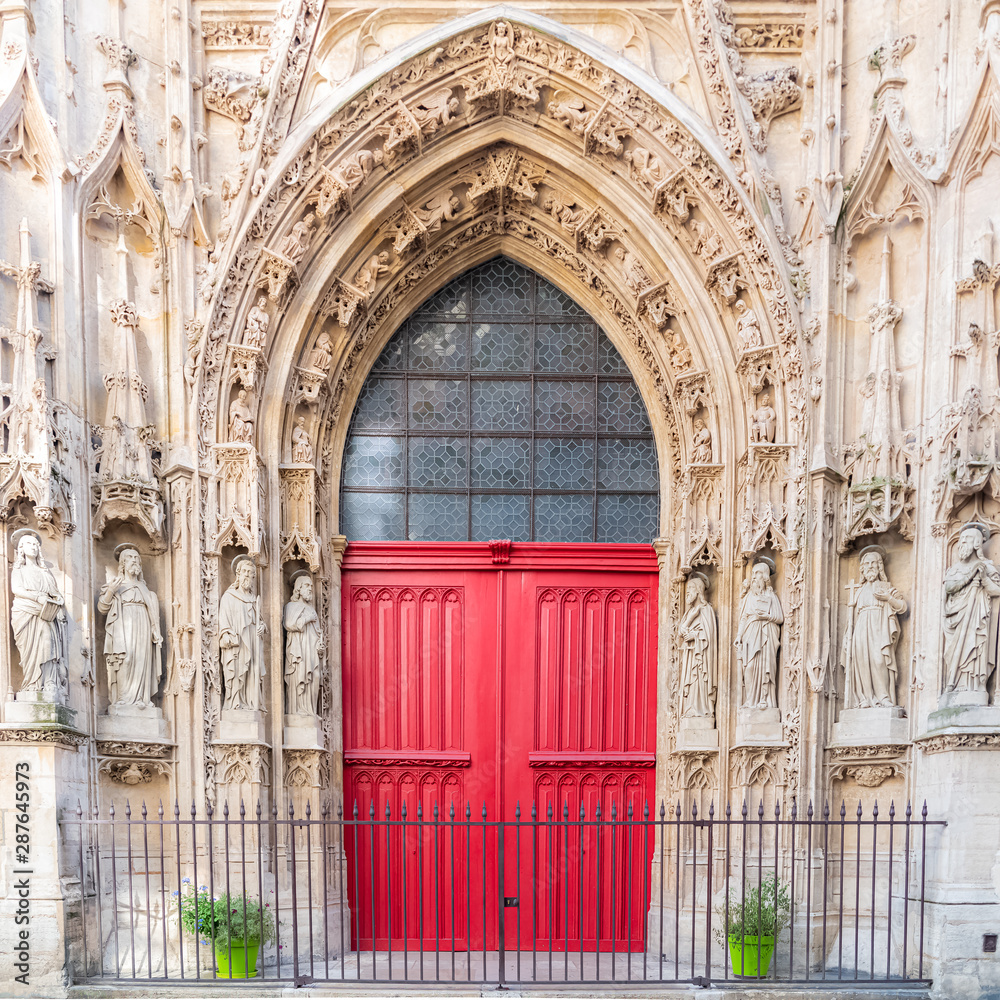 Paris, the beautiful Saint-Merri church in the center, red wooden door