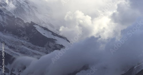 4K Timelapse of Dramatic Storm and Mist on Mount Rainier at Sunset