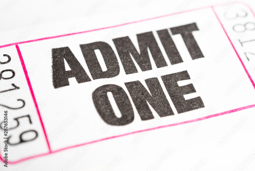A macro or close-up shot of a strip of generic white sequentially numbered admittance ticket. A macro or close-up shot of a strip of generic white sequentially numbered admittance ticket.