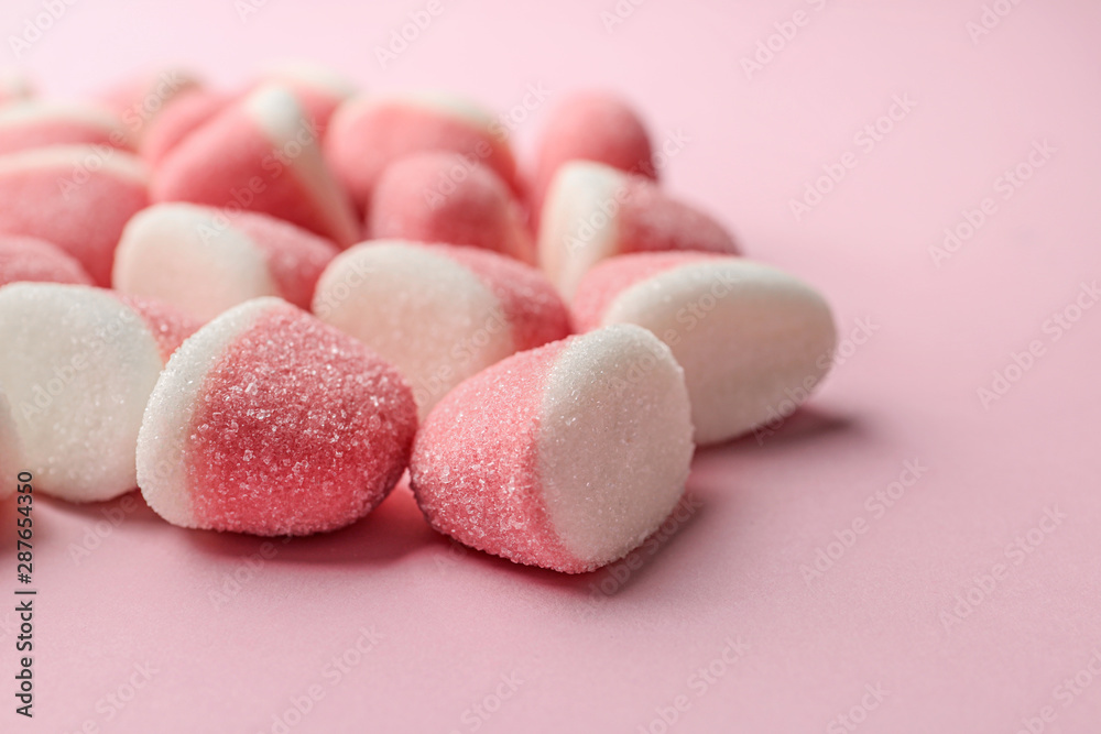 Closeup of sweet jelly candies on pink background Closeup of sweet jelly candies on pink background