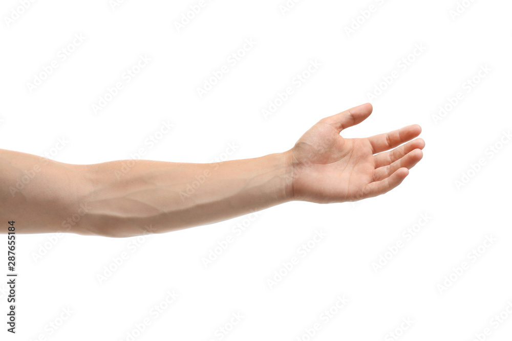 Young man held out hand on white background, closeup Young man held out hand on white background, closeup