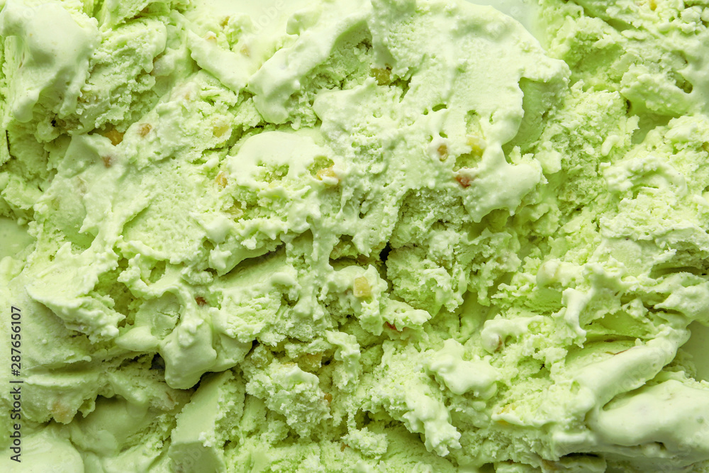 Delicious refreshing pistachio ice cream as background, closeup Delicious refreshing pistachio ice cream as background, closeup