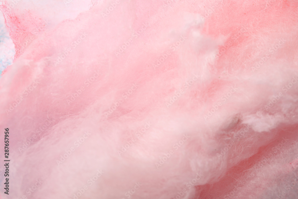 Sweet pink cotton candy as background, closeup view