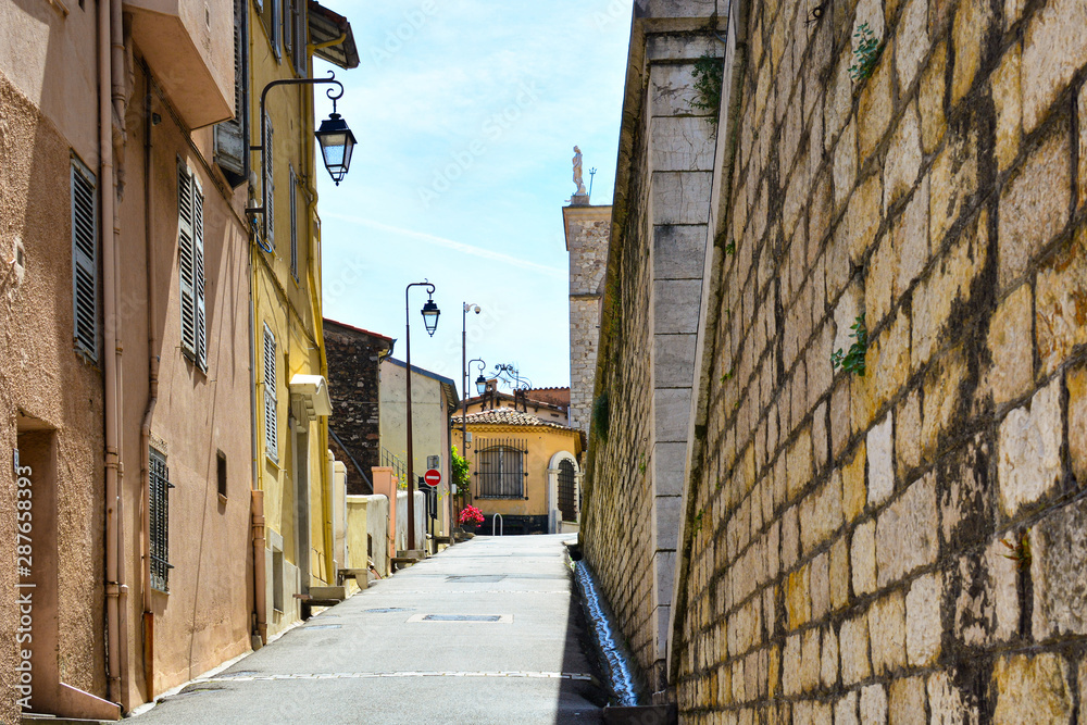 Fototapeta premium The city of Cannes in France. Beautiful streets and buildings of the old town in the Provence region
