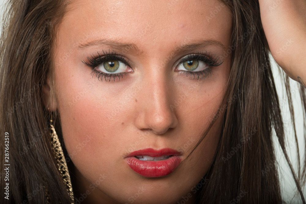 Close-up of an attractive teenage girl. Close-up of an attractive teenage girl.