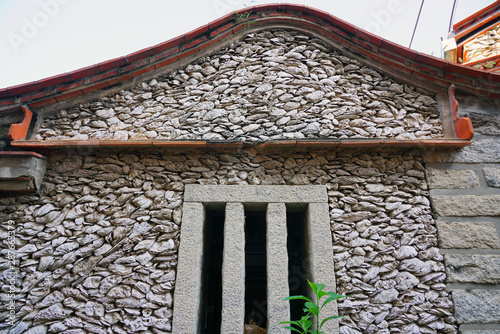 View of a traditional cultural relic house made of oyster shells (hekecuo) in Xunpu Village, Quanzhou, Fujian province, China photo