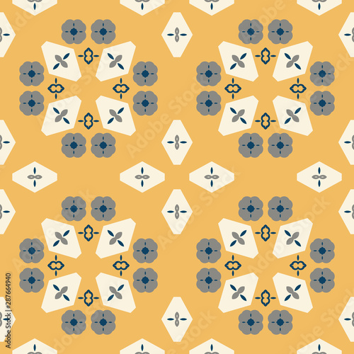 Modern stylized mosaic seamless pattern in mustard yellow, gray, and light beige with navy blue. Contemporary simple geometrics with decorative elements, great for textiles, paper and fashion uses.