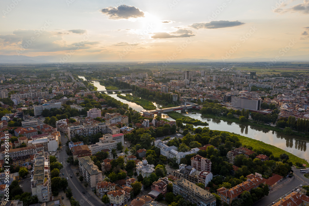 Aerial view of Plovdiv with hills and Maritsa river during sunset