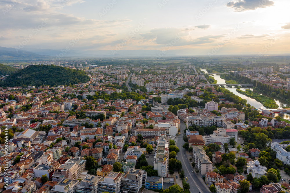 Aerial view of Plovdiv with hills and Maritsa river during sunset