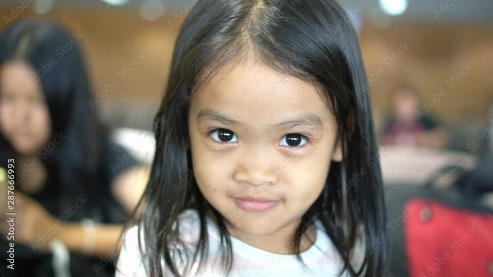 A young girl who was smiling for the camera A young girl who was smiling for the camera