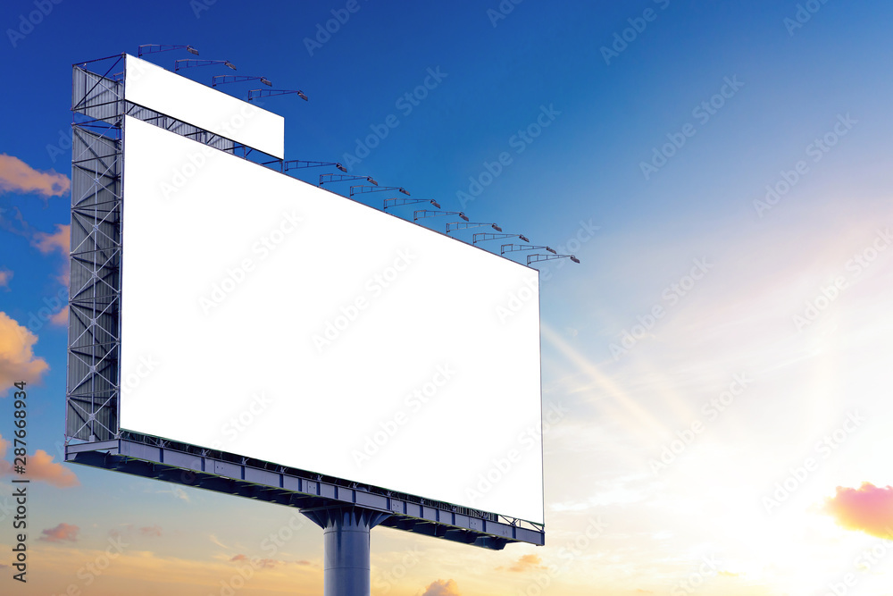 Blank billboard mockup with white screen against clouds and sunset with sunlight background. Copy space banner for advertisement. Business Concept. Blank billboard mockup with white screen against clouds and sunset with sunlight background. Copy space banner for advertisement. Business Concept.