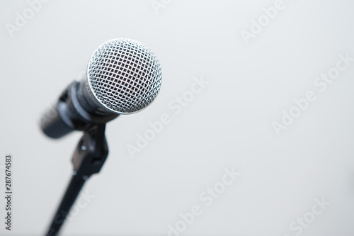 Selective focus of Microphone on a white background