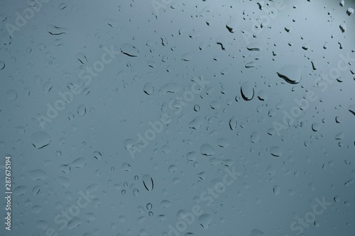 close up rain drops on windows glass.