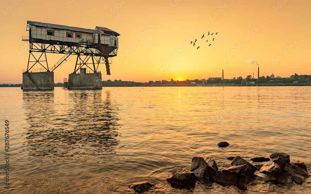 Abandoned coal loader in the Danube river. Near by Esztergom.